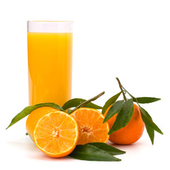 Tangerines and juice glass