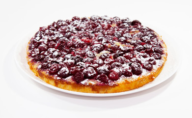 Tasty cherry pie with powdered sugar