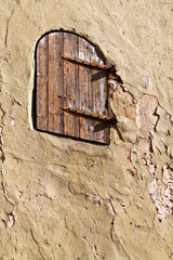 Door on the wall of the historical storehouse.