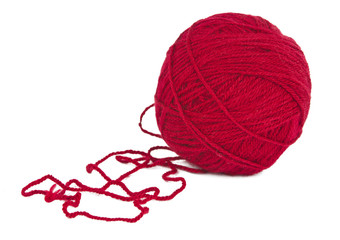 ball of red yarn is isolated