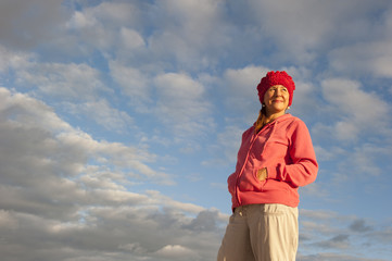 Portrait attractive mature woman at sunrise