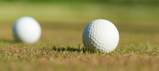 golf balls on grass