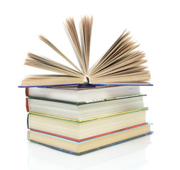 stack of books on a white background close-up