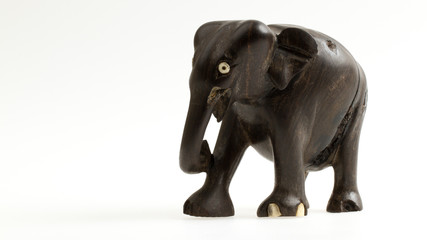 Fototapeta na wymiar Very old ivory statue of an elephant
