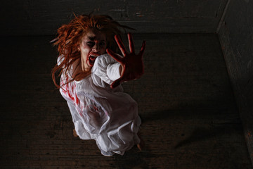 Horror Themed Image With Bleeding Freightened Woman