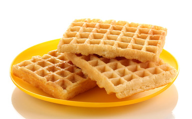 Sweet waffles on plate isolated on white