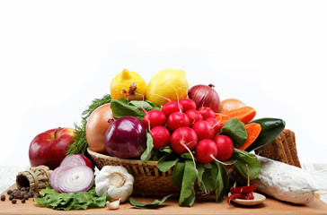 Healthy food. Fresh vegetables and fruits on a wooden table.