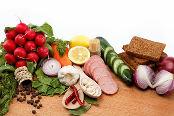 Healthy food. Fresh vegetables and fruits on a wooden table.