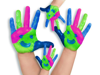 Four coloured child´s hand on white background