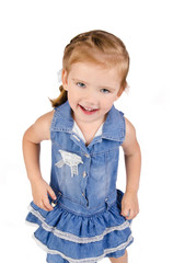 Portrait of cute smiling little girl in dress