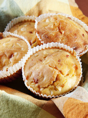 Freshly baked cornbread muffins with cheddar cheese
