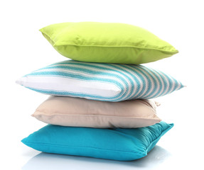 Fototapeta na wymiar bright pillows isolated on white