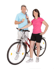 Mature active couple doing sports