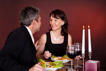 Couple at romantic dinner in restaurant