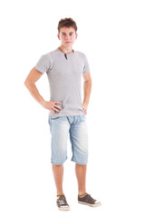 Young man with hands on hips