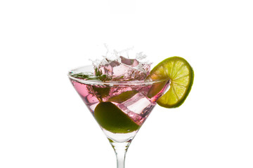 Ice cubes falling into a cocktail