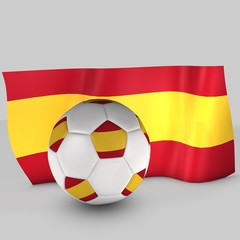 balón de fútbol y bandera de España