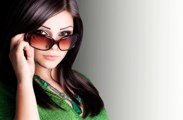 Portrait of beautiful girl wearing sunglasses