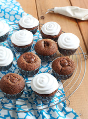 Chocolate cupcakes with cream  frosting