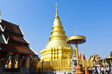 Naklejka premium Golden Pagoda at Wat Phra That Hariphunchai , Lamphun Province,