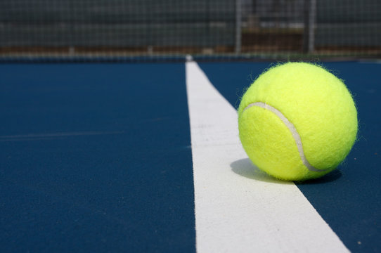 Tennis Ball on the Court