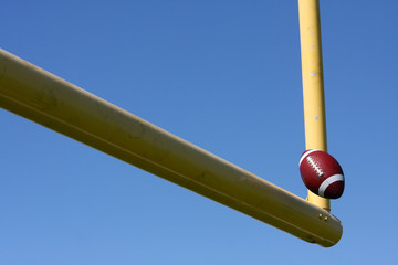 Football kicked through the Goal Posts © 33ft