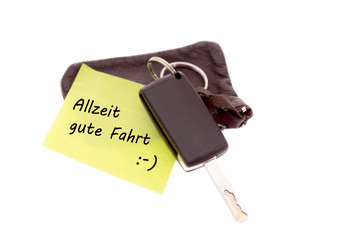 Autoschlüssel mit Notiz Allzeit gute Fahrt