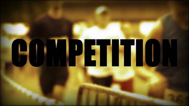 Competition Schriftzug mit L&auml;ufern im Hintergrund