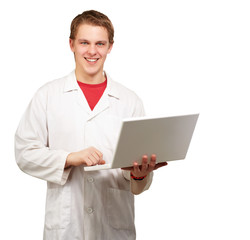 portrait of young student holding laptop over white background