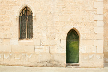 Fototapeta na wymiar wall with a window and a door
