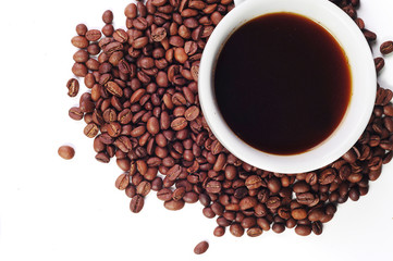 Coffee beans and a cup of coffee