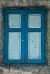 old dirty blue window