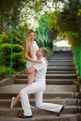 Portrait of young happy smiling cheerful attractive couple toget