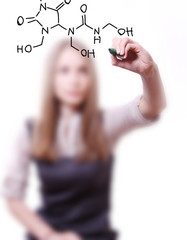 woman chemist shows a molecular structure