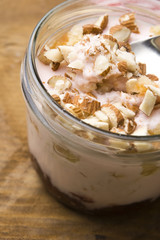 Sweet dessert in glass jar - strawberry cake