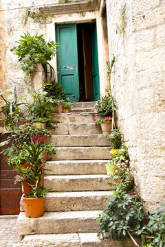 View on open green door - Trogir