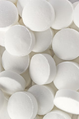 Small white pills macro