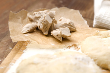 Baker's yeast on wooden board