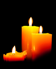 Group of three candles lights