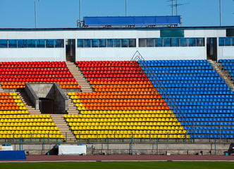 Empty rows of seats at football stadium