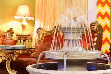 beautiful fountain in eastern luxury restaurant;