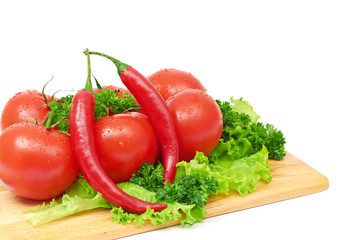Composition with raw vegetables on kitchen table
