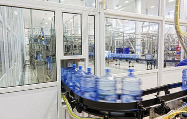 Modern industrial shop on pouring mineral water