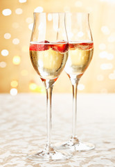 Festive champagne flutes with strawberries