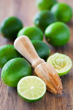 Squeezer and fresh limes