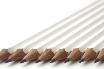 Row of white pencils