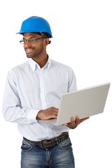 Architect in hardhat with laptop