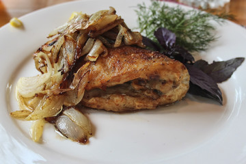 Pike perch roasted with onions