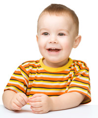 Portrait of a cute cheerful little boy