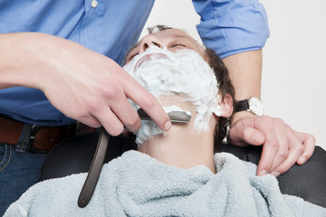 Obraz na płótnie Canvas Man Getting Shaved